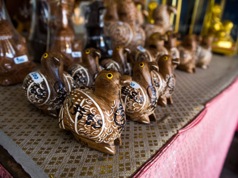 Carving small animal figures from wood