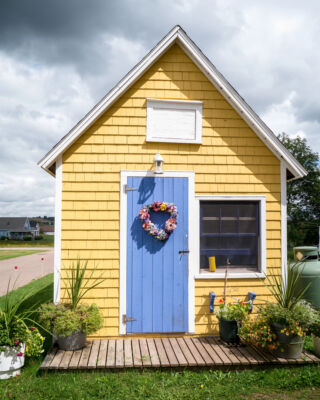 brightly painted multi-toned shed, showing one of the best shed paint ideas