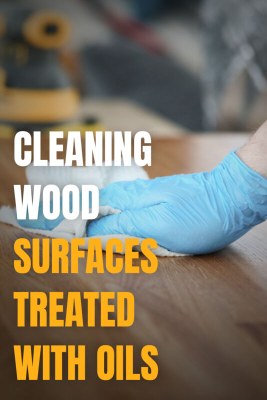 man Cleaning Wood Surfaces Treated With Oils