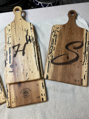 DIY noodle board with wood stain and lettering designs